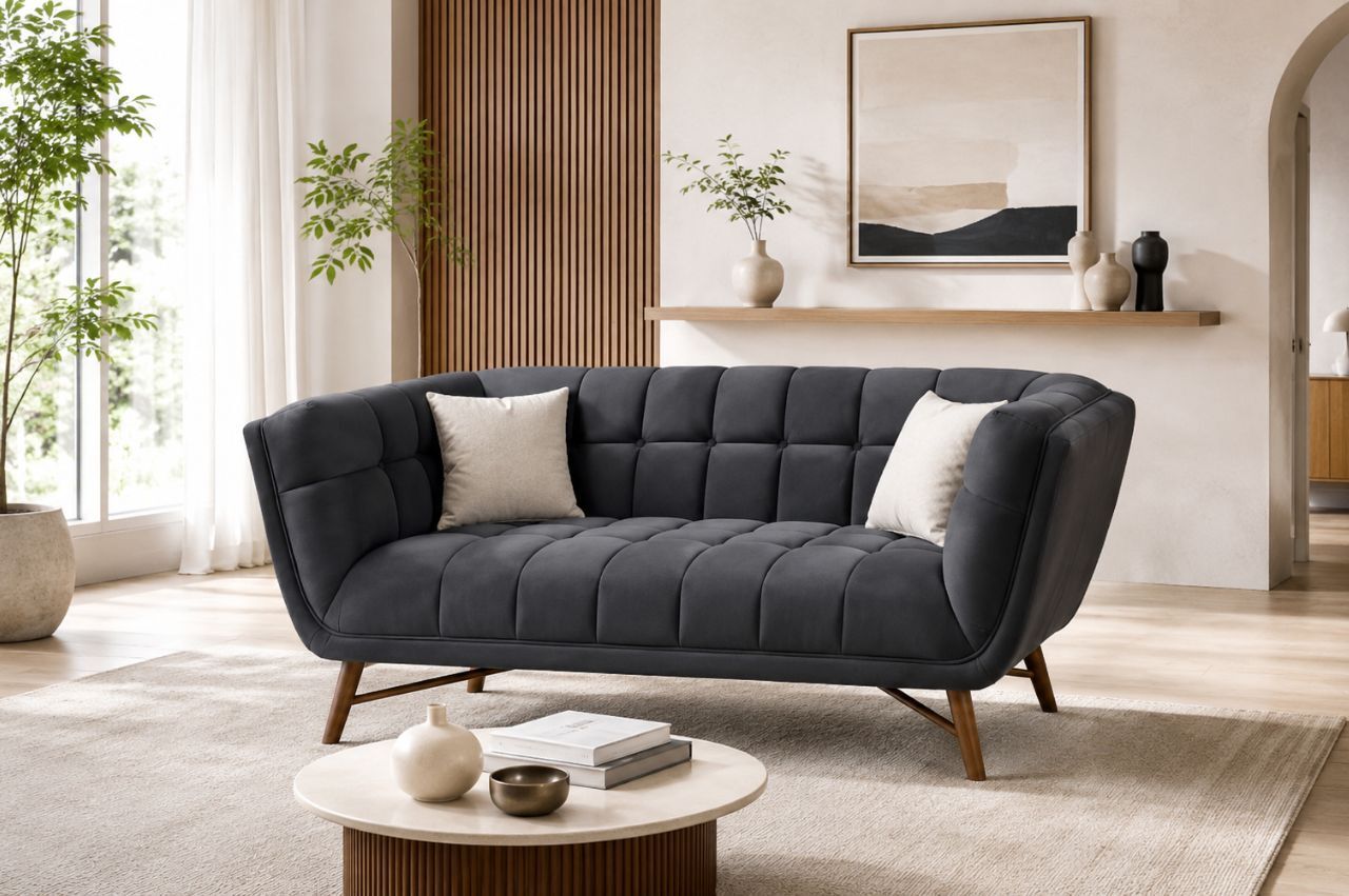 Modern tufted loveseat in a bright condo living room designed for small spaces