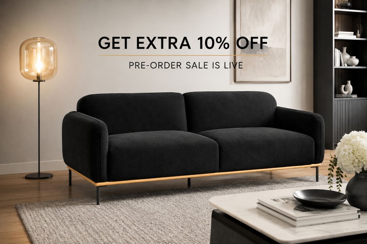 Modern black velvet sofa featured in the Accents@Home pre-order furniture sale with an extra 10% discount on upcoming living room arrivals.