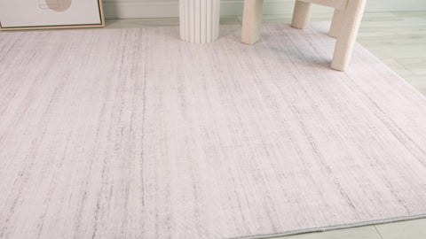 Europa Beige Solid Textured Area Rug