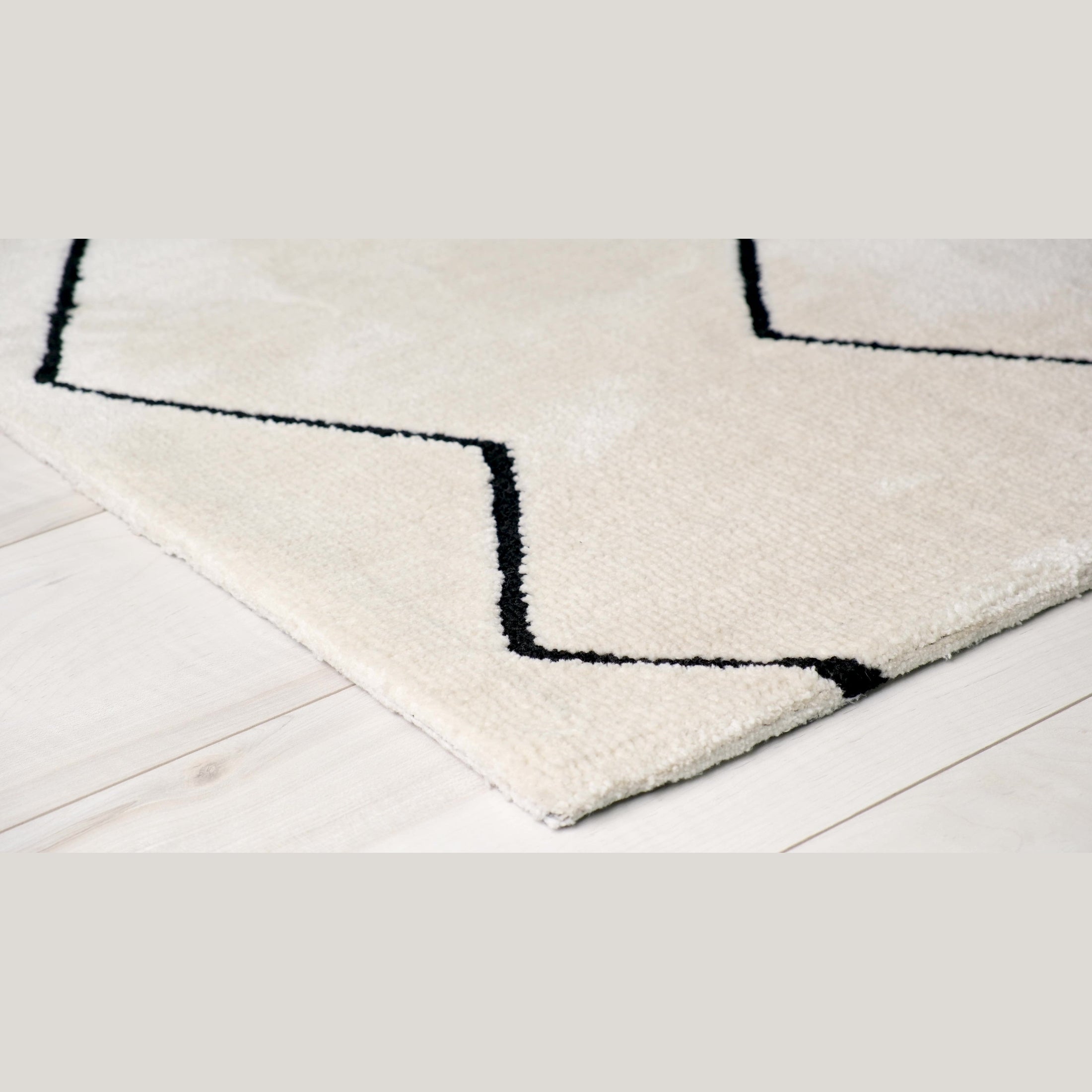 Ivory Leela Minimalist Brushstroke Area Rug