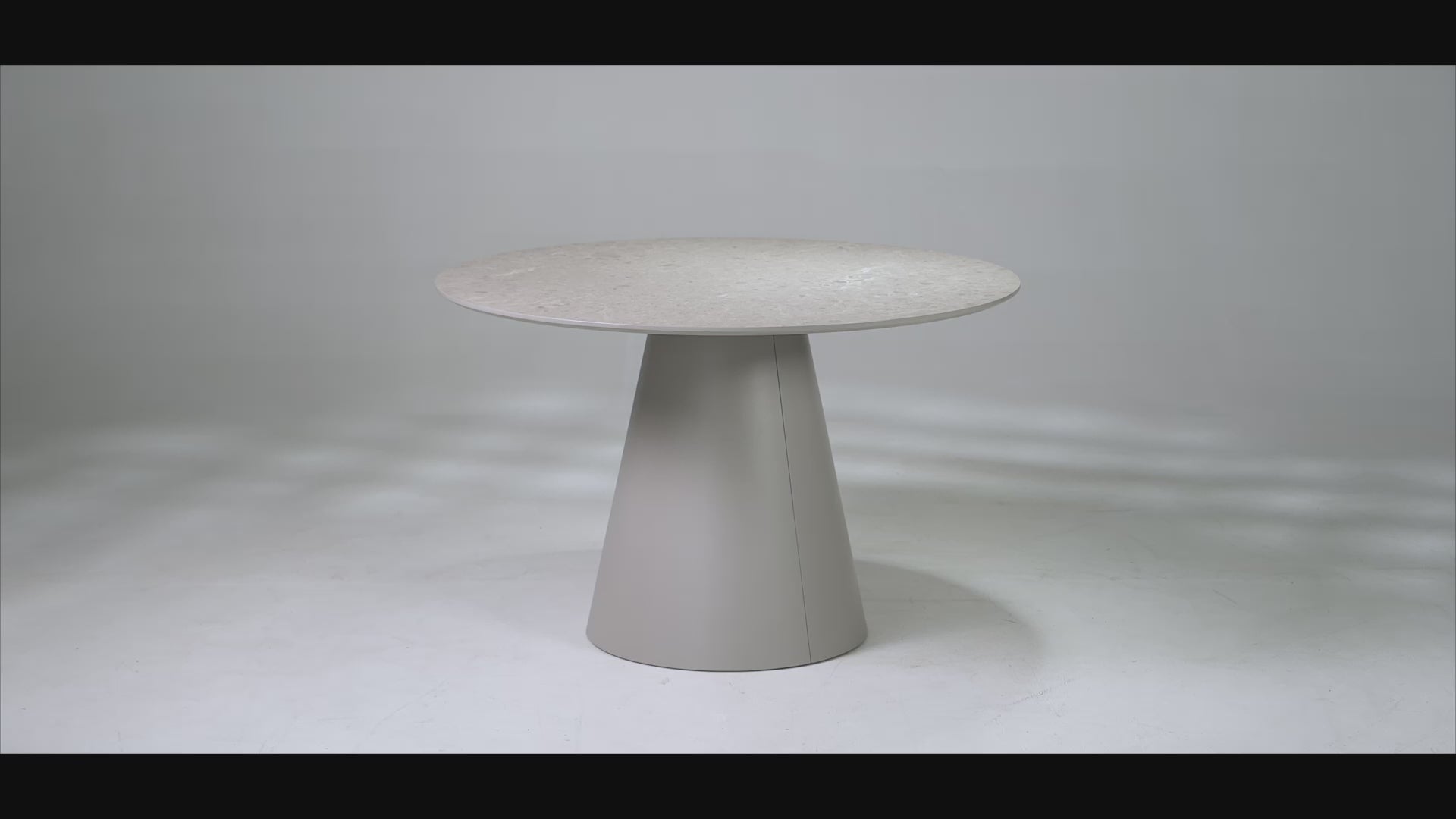 Load video: Alexios Round Matt Finish Dining Table